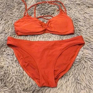 Rust colored swimsuit.